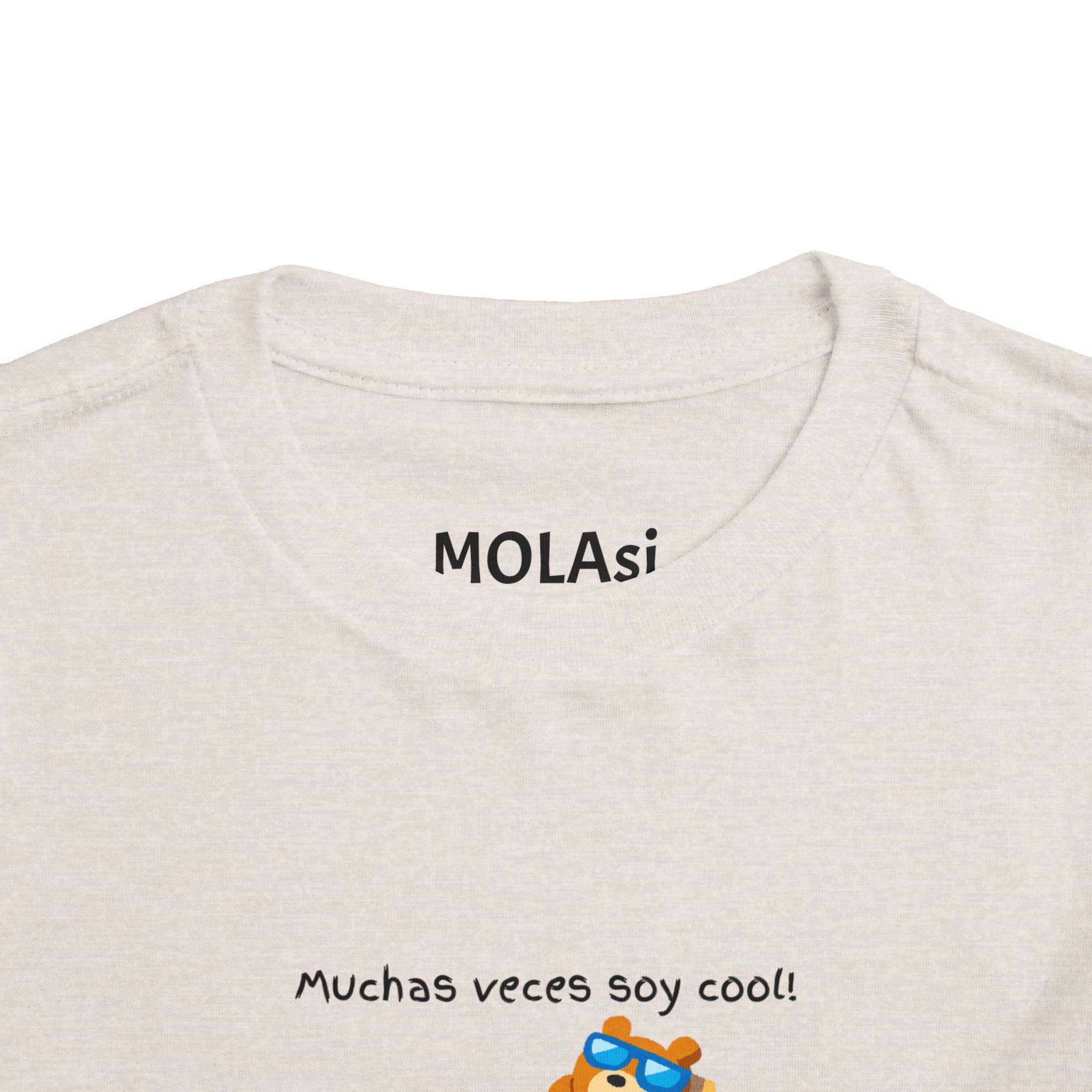 Toddler tee with "Muchas veces soy cool!" Spanish text and bear graphic