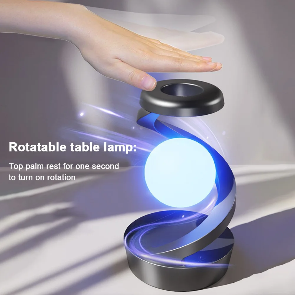Rotatable table lamp with palm rest for one second rotation activation