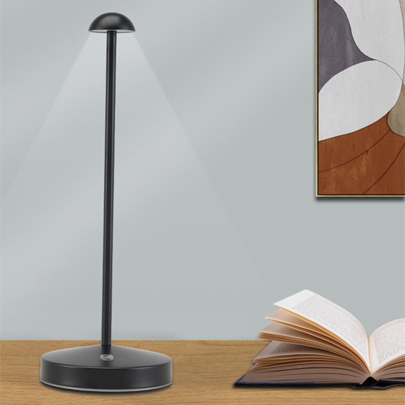 Molanizzi black minimalist LED desk lamp with adjustable brightness, perfect for reading.