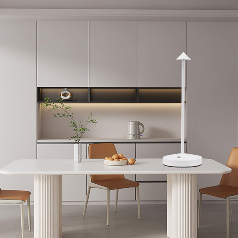 Molanizzi modern white LED table lamp on minimalist dining table.